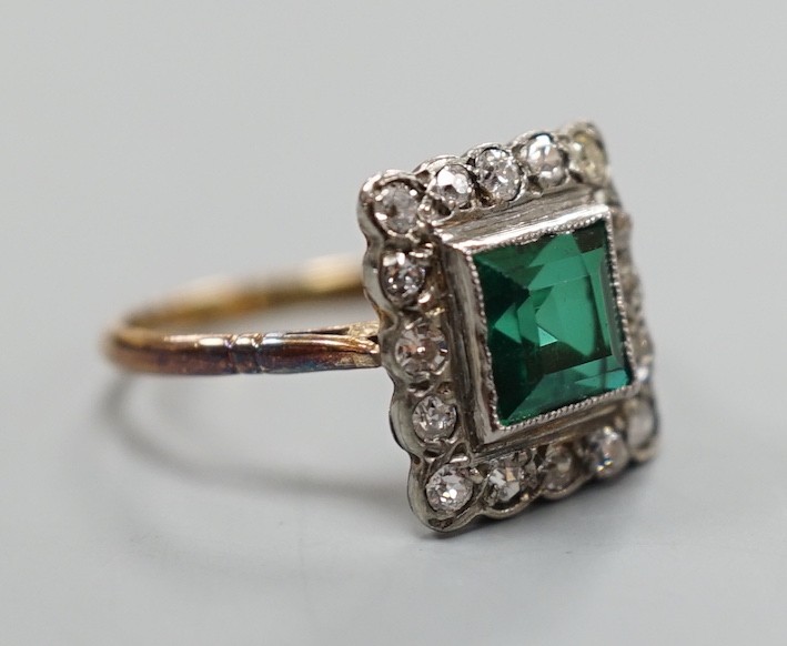 An 18ct gold, green paste? and diamond set square cluster ring, size L, gross weight 2.2 grams.